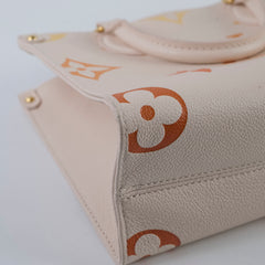 Louis Vuitton On The Go Tote PM Empreinte Orange/Cream Louis Vuitton On The Go Tote PM Empreinte Orange/Cream