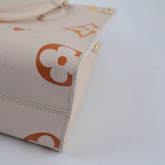Louis Vuitton On The Go Tote PM Empreinte Orange/Cream Louis Vuitton On The Go Tote PM Empreinte Orange/Cream