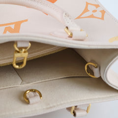 Louis Vuitton On The Go Tote PM Empreinte Orange/Cream Louis Vuitton On The Go Tote PM Empreinte Orange/Cream