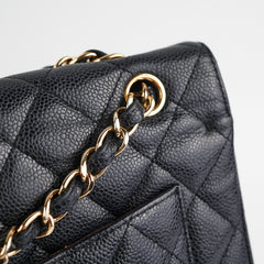 Chanel Maxi Jumbo Double Flap Black Caviar