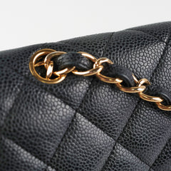 Chanel Maxi Jumbo Double Flap Black Caviar