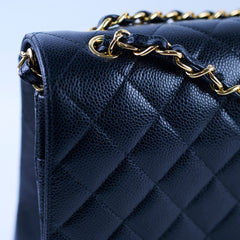 Chanel Maxi Classic Double Flap Black Caviar 2022