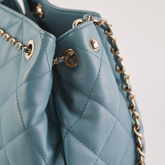 ITEM 16 - Chanel Drawstring Bucket Bag Light Blue
