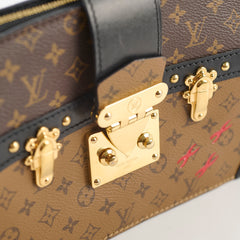 Louis Vuitton Monogram Reverse Trunk Clutch Bag