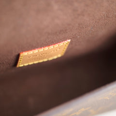 Louis Vuitton Pochette Camille Monogram Canvas