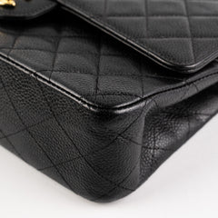 ITEM 17 - Chanel Vintage Classic Medium/Large Black Caviar 24K Gold