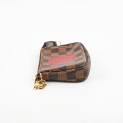 Louis Vuitton Mini Pochette Monogram Trunks & Bags