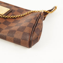 ITEM 22 - Louis Vuitton Eva Clutch Damier Ebene