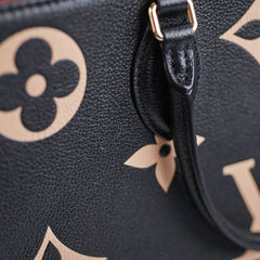 ITEM 18 - Louis Vuitton OnTheGo MM Bicolour
