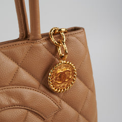 ITEM 28 - Chanel Medallion Beige Caviar