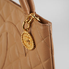 ITEM 28 - Chanel Medallion Beige Caviar