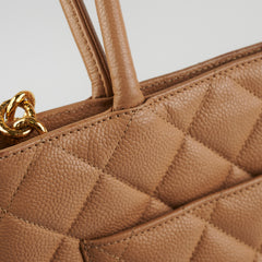 ITEM 28 - Chanel Medallion Beige Caviar