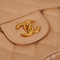 ITEM 24 - Chanel Quilted Jumbo Single Flap Beige