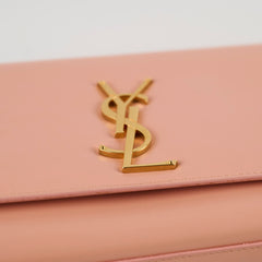 Saint Laurent Cassandre Clutch in Pale Pink Smooth Leather