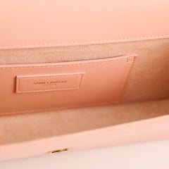 Saint Laurent Cassandre Clutch in Pale Pink Smooth Leather