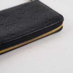 Louis Vuitton Exotic Python Black Zippy Wallet