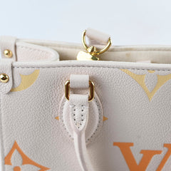 Louis Vuitton On The Go PM Empreinte Orange/Cream
