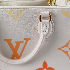 Louis Vuitton On The Go PM Empreinte Orange/Cream