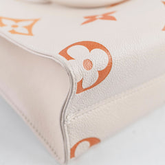 Louis Vuitton On The Go PM Empreinte Orange/Cream