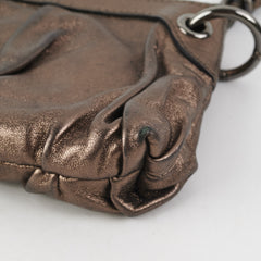Gucci Metallic Bronze Tassel Pouch