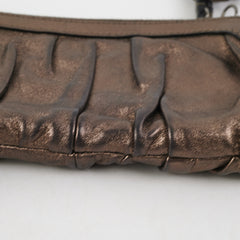 Gucci Metallic Bronze Tassel Pouch