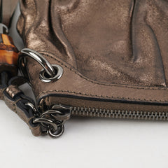 Gucci Metallic Bronze Tassel Pouch