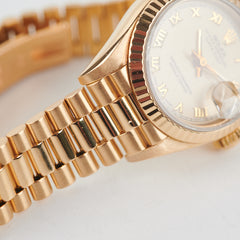 Rolex Lady Datejust 18K Gold Roman Numerals Champagne Dial 26mm President Strap